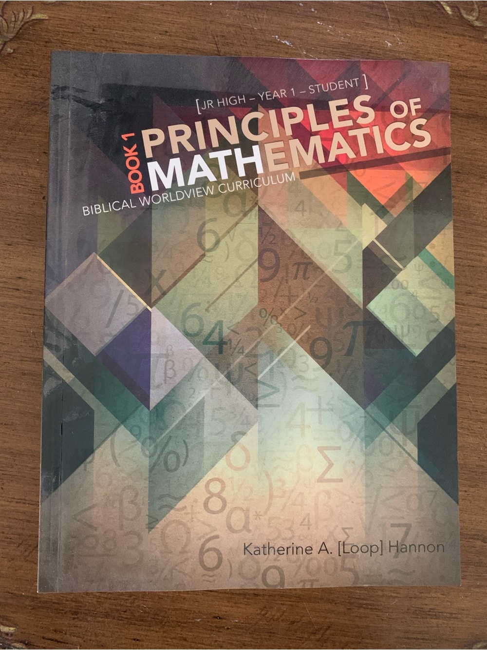 Principles of Mathematics Book 1 - Geometric Multicolor Cover